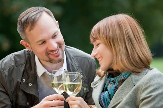 Romantic couple drinking champagne