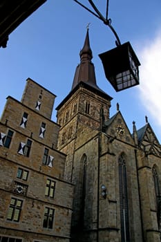 Market square in Osnabrück: From the steps of the town hall,the view goes to the city scales and St. Mary's,the Evangelical Lutheran parish and market church. The oldest "Bürgerkirche"" in Osnabrück - located in the immediate vicinity of the cathedral - received the p"