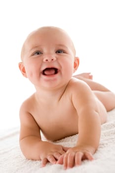Baby lying down smiling