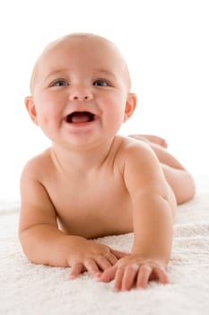 Baby lying down smiling