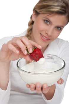 Healthy lifestyle series - Woman holding strawberry and yogurt