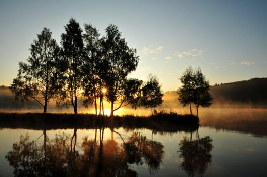 Morning atmosphere at a lake in the Harz Mountains