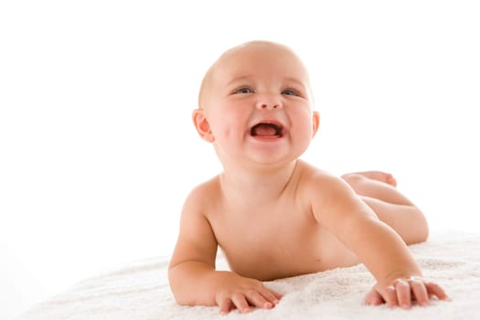 Baby lying down smiling