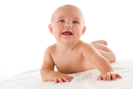 Baby lying down smiling
