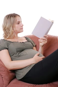 Pregnant woman reads book