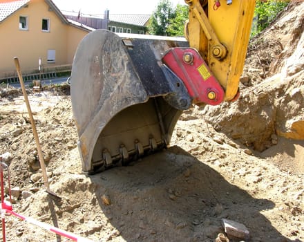 Cropped with shovel of an excavator on construction site