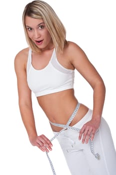 Fitness - Woman measuring waist