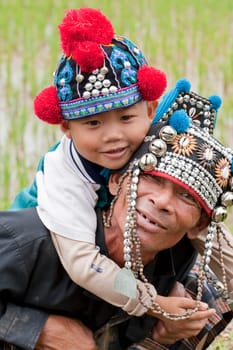 Man with child in Thailand,Akha