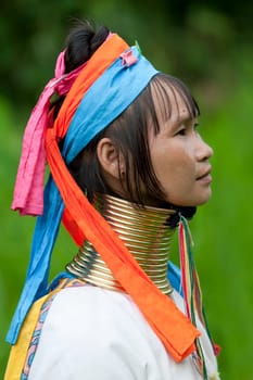 Portrait of long-necked woman