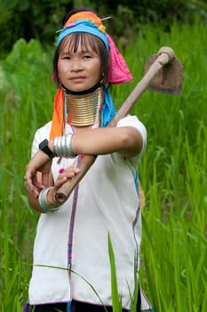 Portrait of long-necked woman