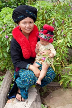 Asian woman with baby from Laos