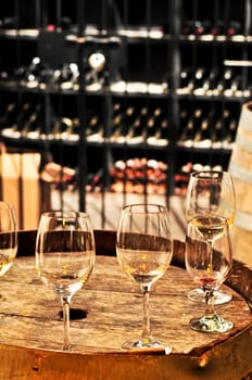 Wine  glasses and barrels