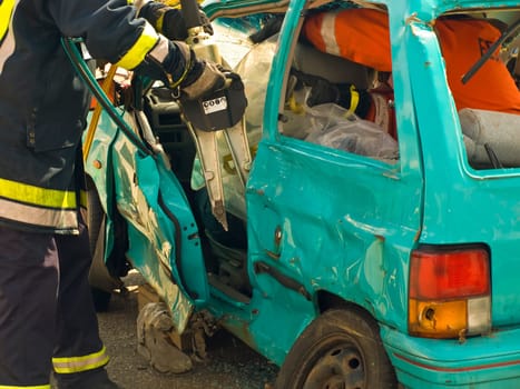 Fire brigade operation with rescue scissors