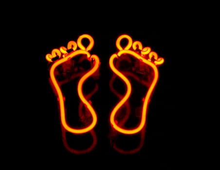 Neon pair of feet