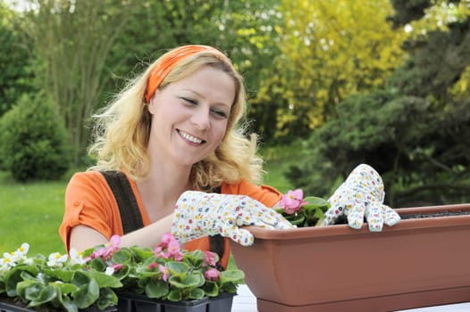 Woman planting flowers
