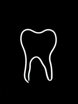 Neon tooth shaped sign