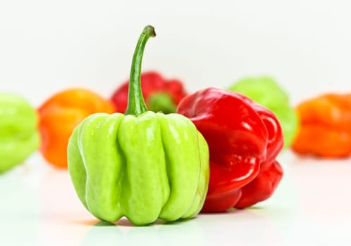 very hot chilly pepper on white board