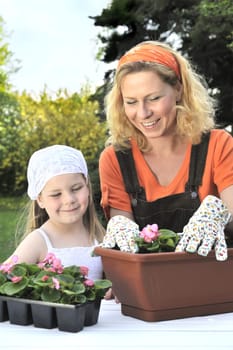 Mother and daughter having gardening tim
