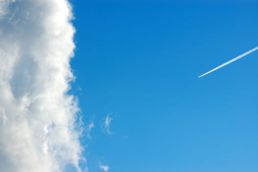 cloud and smoke trail