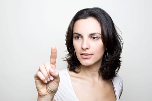 Woman presses on a virtual screen