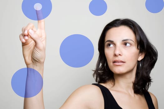 Woman presses on a virtual screen
