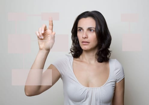 Woman presses on a virtual screen