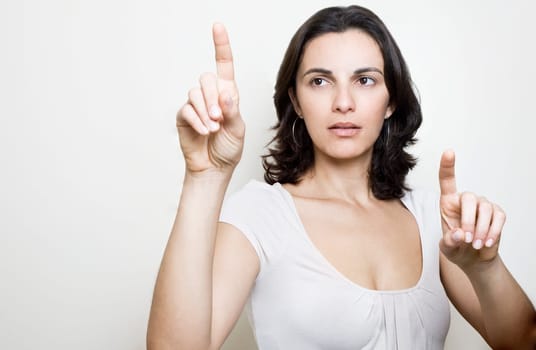 Woman presses on a virtual screen