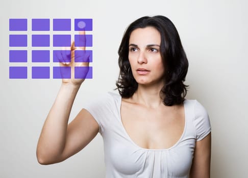 Woman presses on a virtual screen
