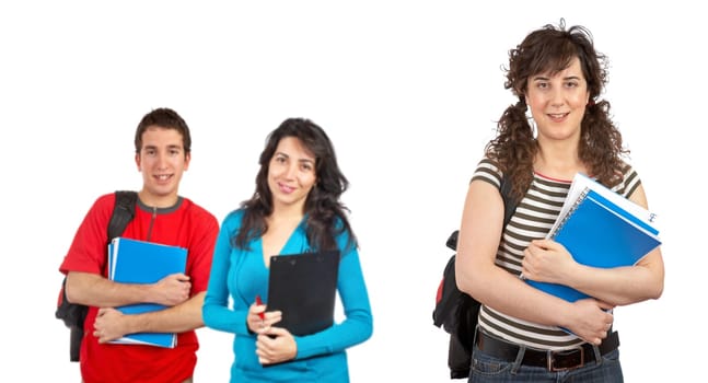 Three students with books and backpacks
