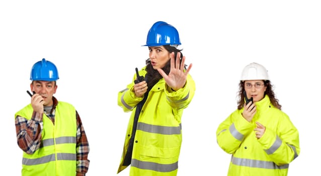 Construction workers talking with a walkie talkie
