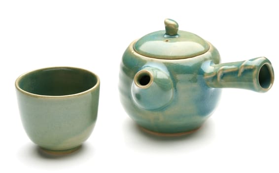 Antique chinese teapot and a tea cup