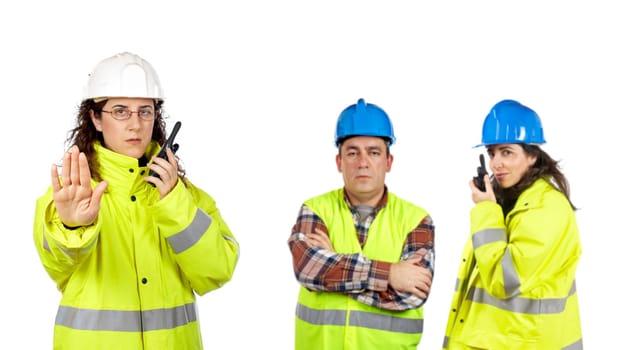 Construction workers talking with a walkie talkie
