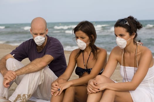 Three young adults with masks against S