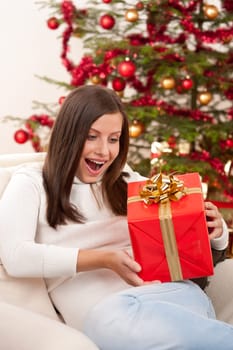 Surprised young woman on Christmas