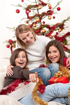 Three cheerful women on Christmas