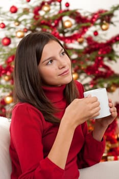 Woman with coffee on Christmas