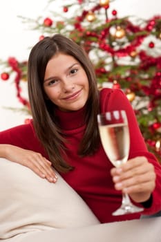 Woman with champagne on Christmas