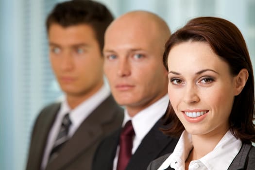 Portrait of young caucasian business people in office