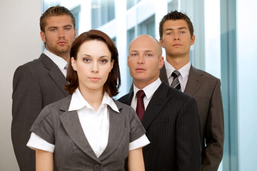 Portrait of young caucasian business people in office