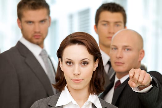 Portrait of young caucasian business people in office