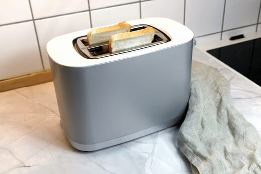 Toaster with two pieces of toast bread. High quality photo