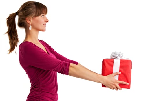 Pretty young woman holding a gift