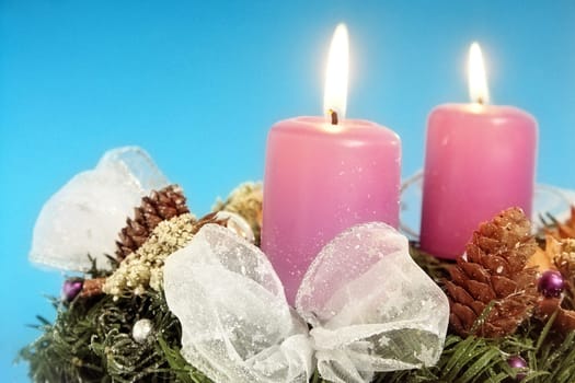 Christmas - wreath from fresh twigs and cones with four candle