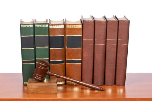 Wooden gavel and old law books