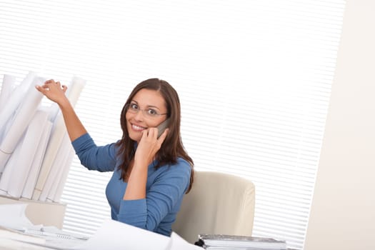 Brown hair female architect at the office