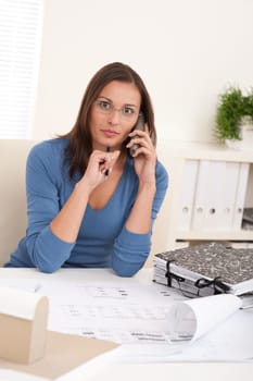 Brown hair female architect at the office