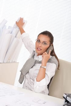 Brown hair female architect at the office