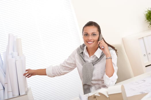 Brown hair female architect at the office