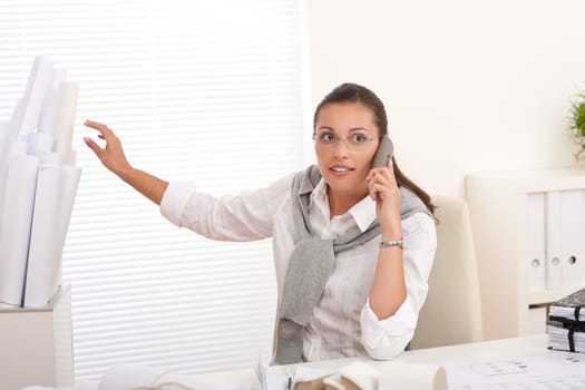 Brown hair female architect at the office