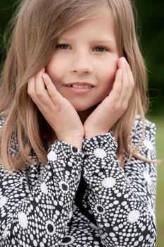 Busy child in the grass